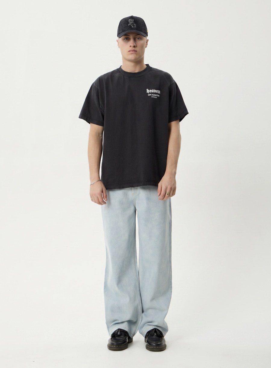 The same model, now wearing a black patterned cap added by Burl AI.